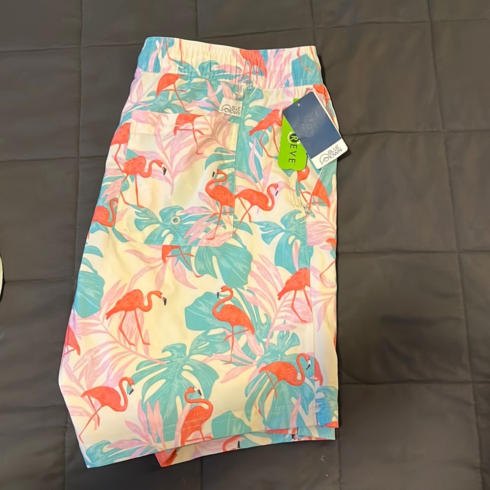 Brand new flamingo swim trunks. Men’s size XL. Front pockets and back.
